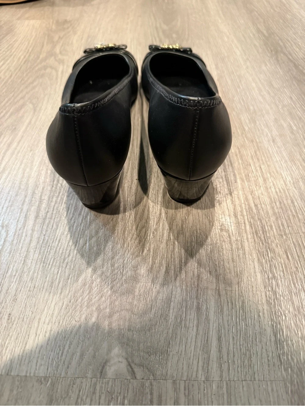 Cole Haan Black Leather Round-Toe Ballet Wedge Heels with Gold Logo Accent